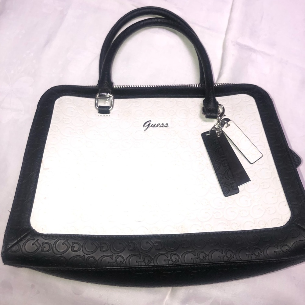 SOLD NWOT Guess purse never used